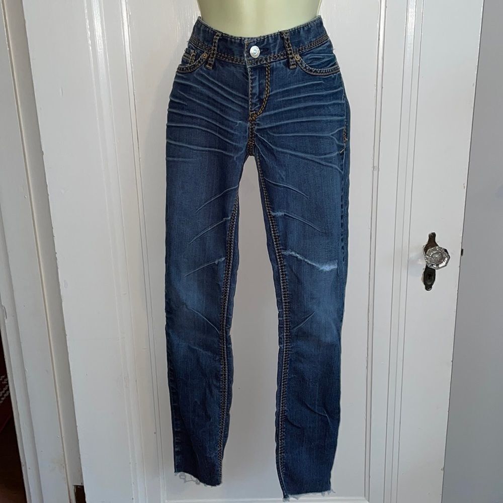Express distressed skinny jeans